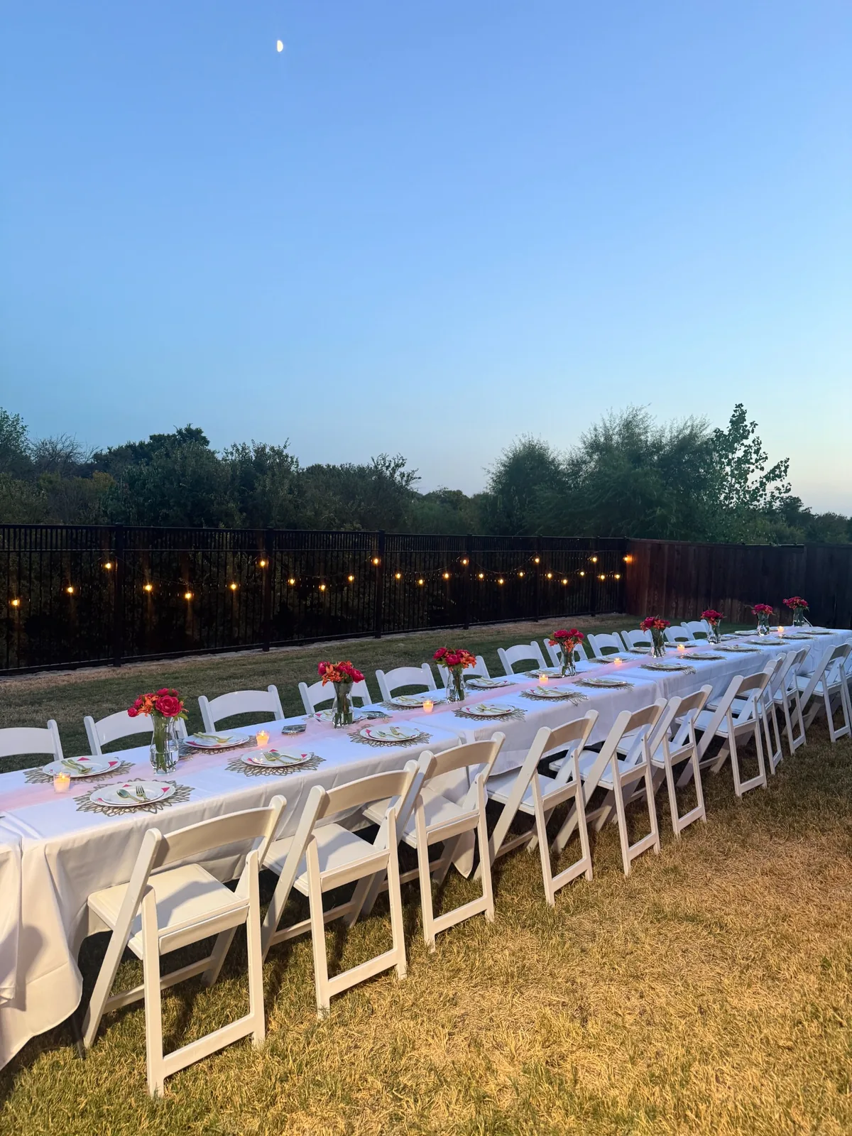 Outdoor Sweet Sixteen tablescape with floral centerpieces
